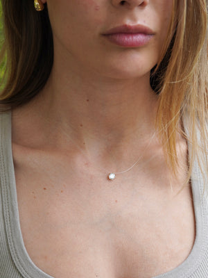 Collana punto luce invisibile