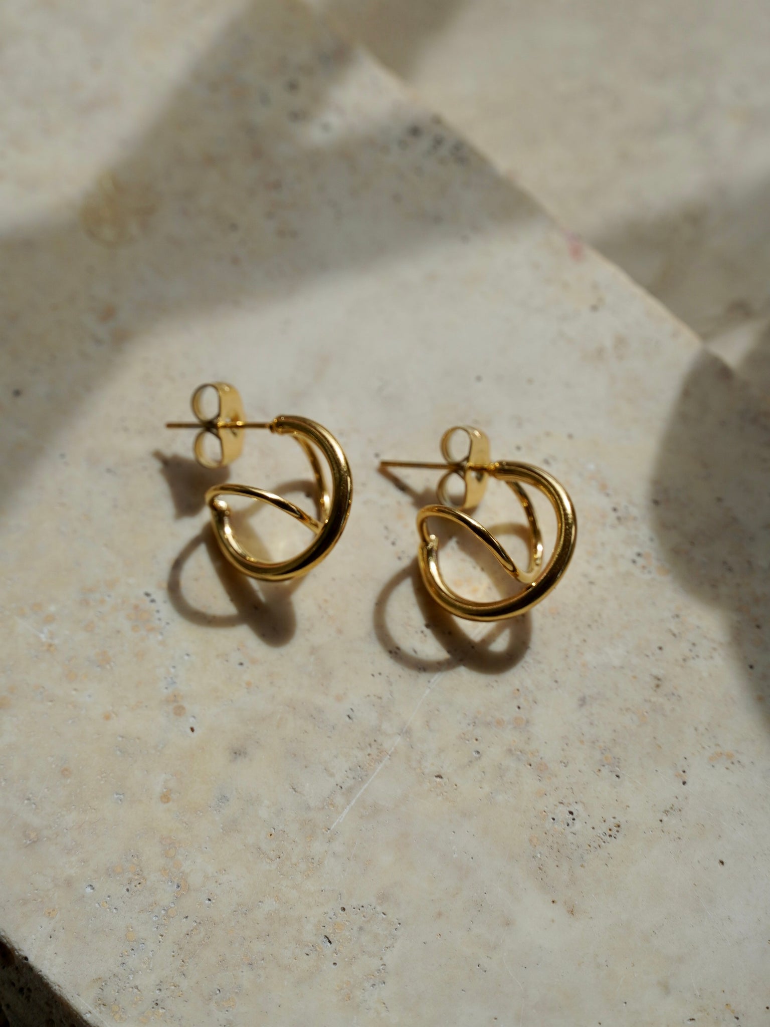 Orecchini abstract hoops